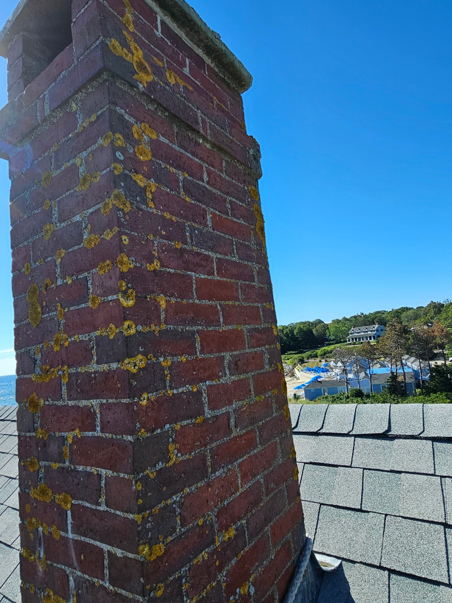 Before — Lichen-covered chimney → full rebuild