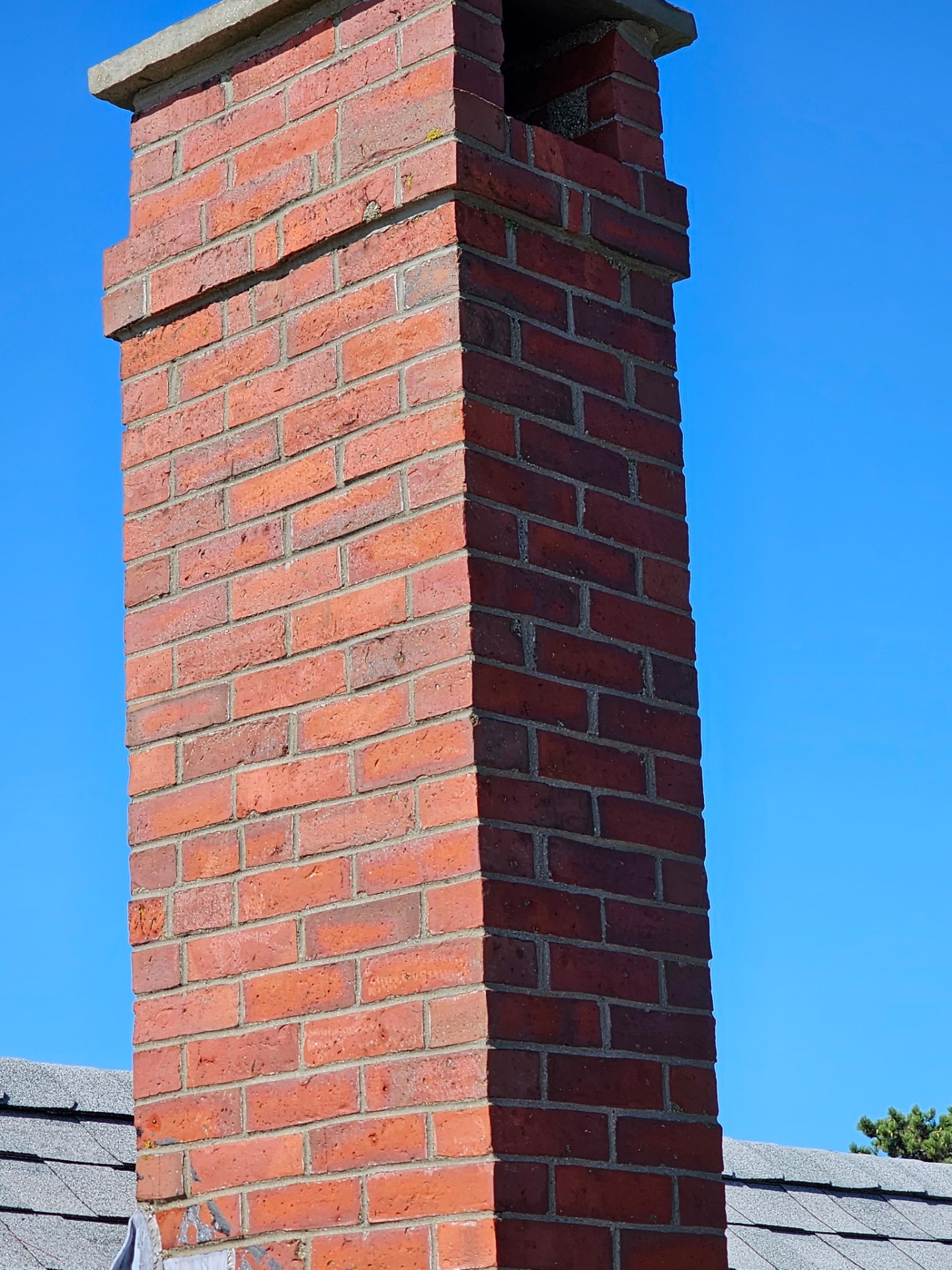 Lichen-covered chimney → full rebuild